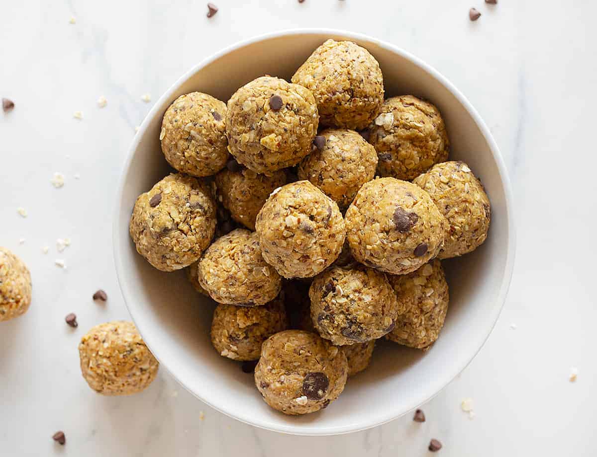 Energy Bites will keep the kids tummies full so you can relax! #energybites #protienbites #snackrecipes #protiensnacks #backtoschool #energy #iamhomesteader #homestead recipes Bowl of Energy Bites