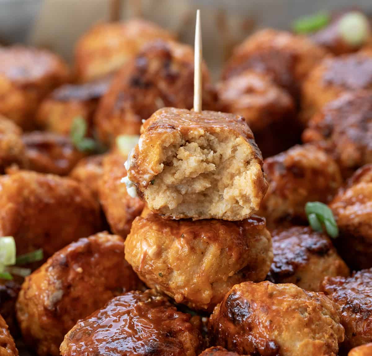 Bit Into Buffalo Chicken Meatball Showing Inside Texture.