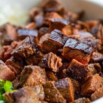 Chopped up Cubes of Chipotle Steak in a Bowl Very Close Up.